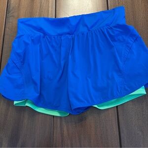 Fabletics Vibrant Blue and Green Athletic Shorts Stretch Waist Lined Pockets